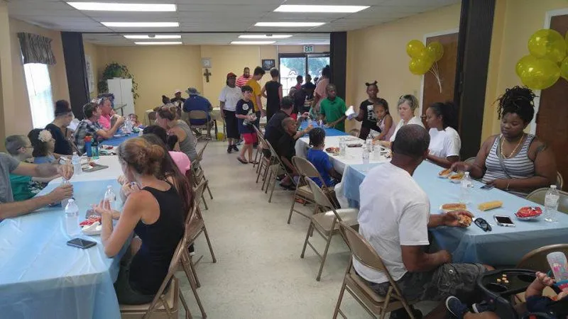Members serving at a New Vision Ministries event