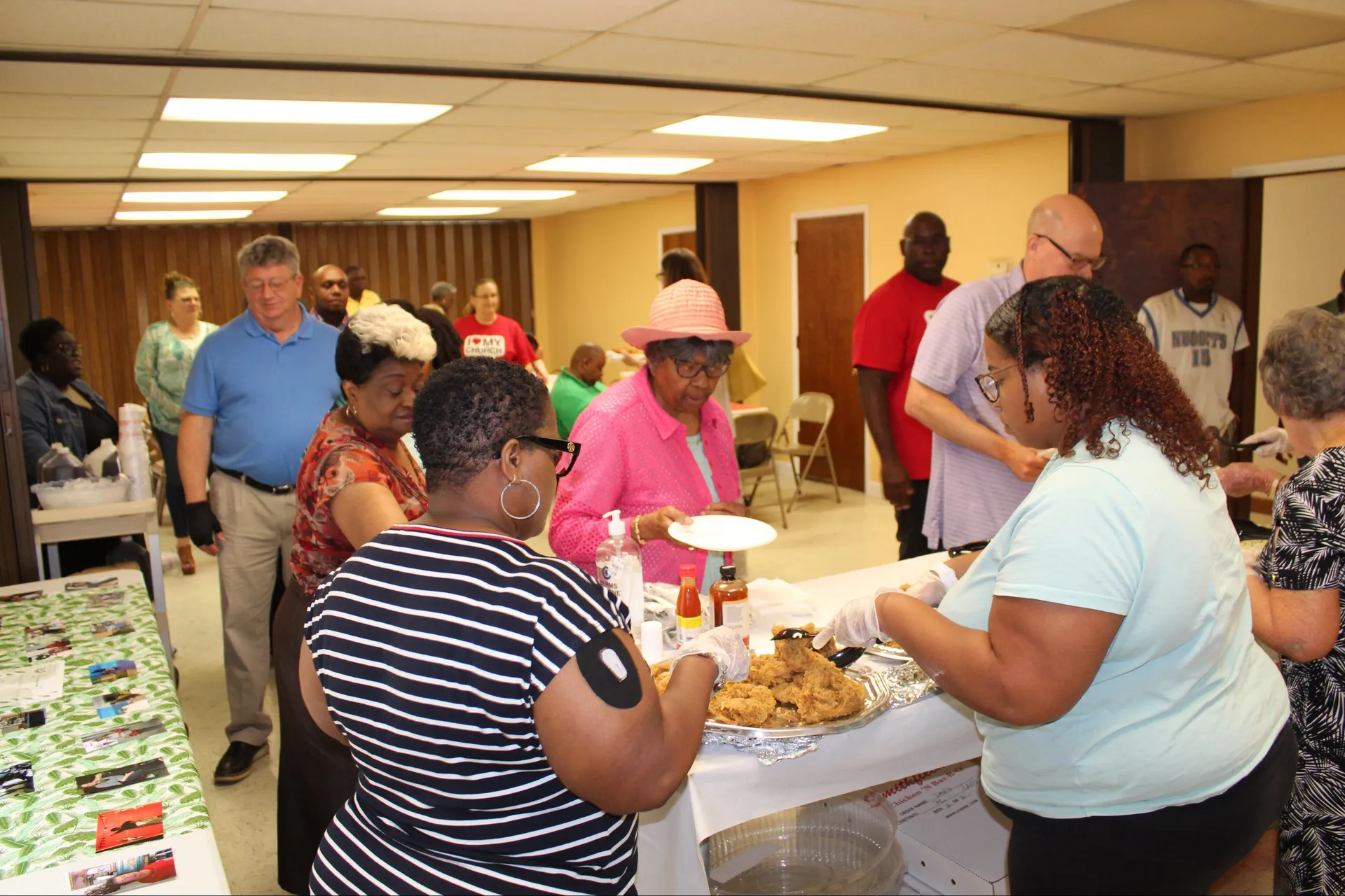 New Vision Ministries church family gathered for a meal