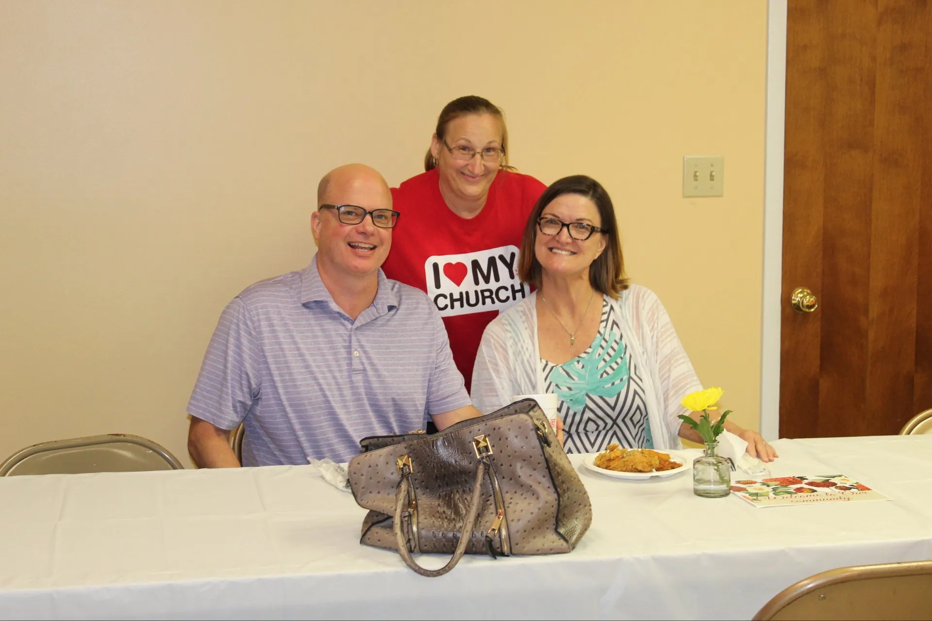 New Vision Ministries members serving food together